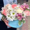 Flowers in blue basket photo