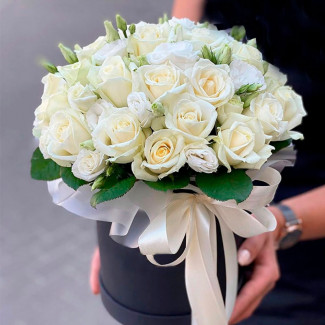 White roses in a black box photo