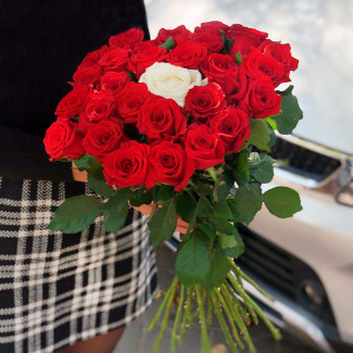25 red roses and 1 white photo