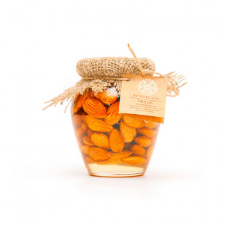Acacia honey with almonds photo